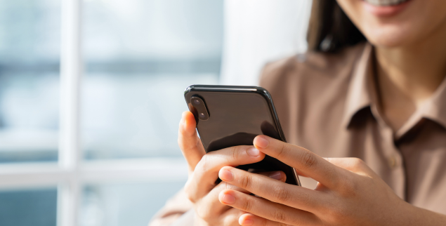 Woman using smartphone to connect with friends